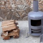 Sobë për një garazh duke përdorur dru: duke e bërë vetë Sobë për ngrohjen e një garazhi